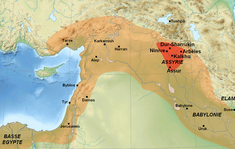 Mapa que muestra en color rojo la extensión original de Asiria y su máxima expansión cuando conquista Egipto